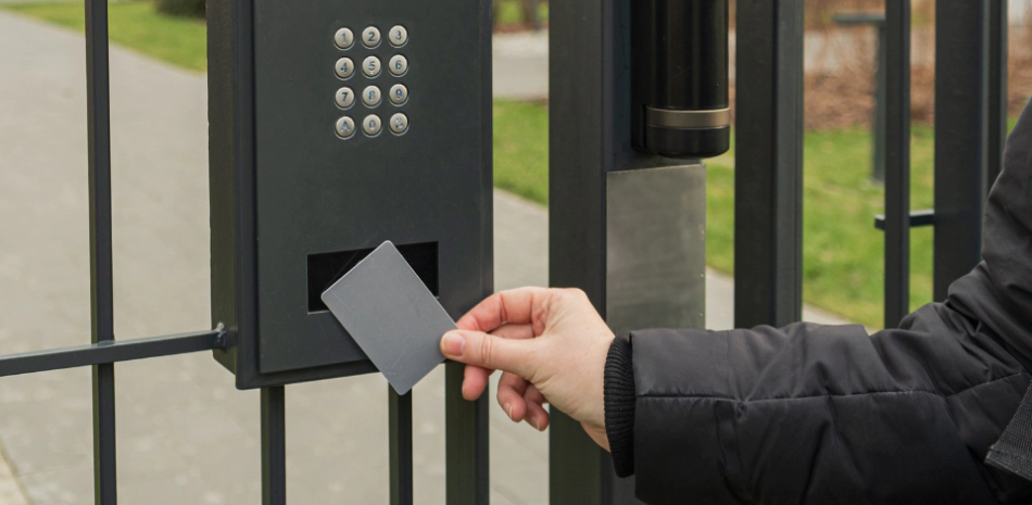 a person using the automated card entry gate